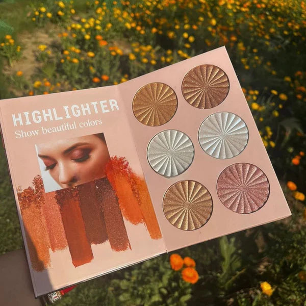 Makeup highlighter palette with circular shades on a natural background