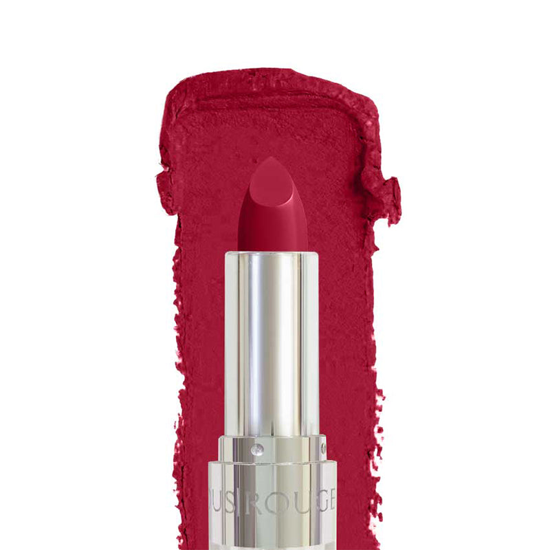 Red lipstick with silver cap on a white background