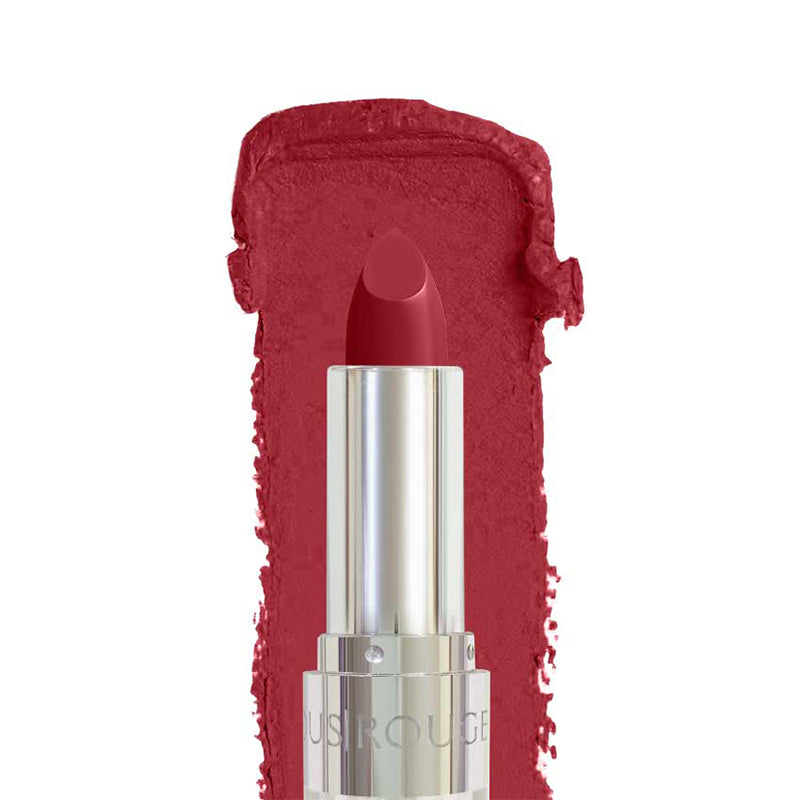 Red lipstick with silver cap on a white background