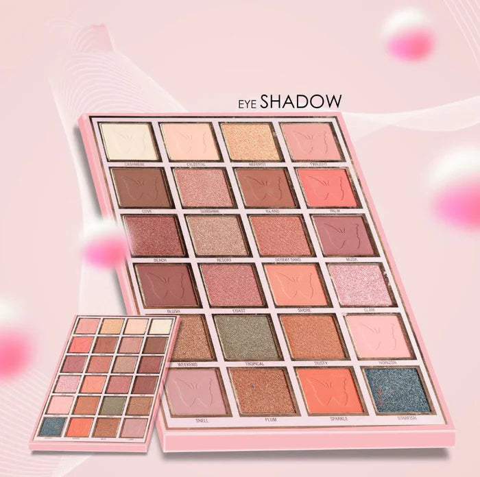 Makeup eye shadow palette with various shades on a pink background