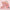 Makeup eye shadow palette with various colors on a pink background