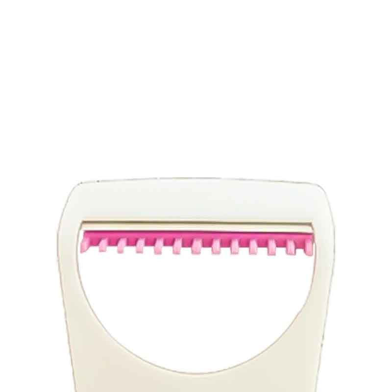 White and pink kitchen peeler on a white background