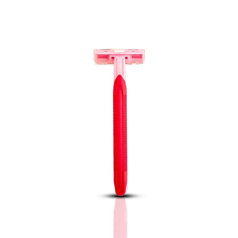 Red and pink razor on a white background