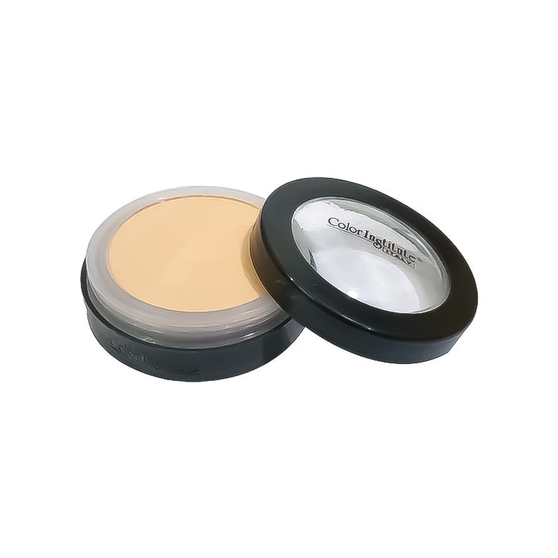 Makeup compact with beige powder and visible brand name on a white background