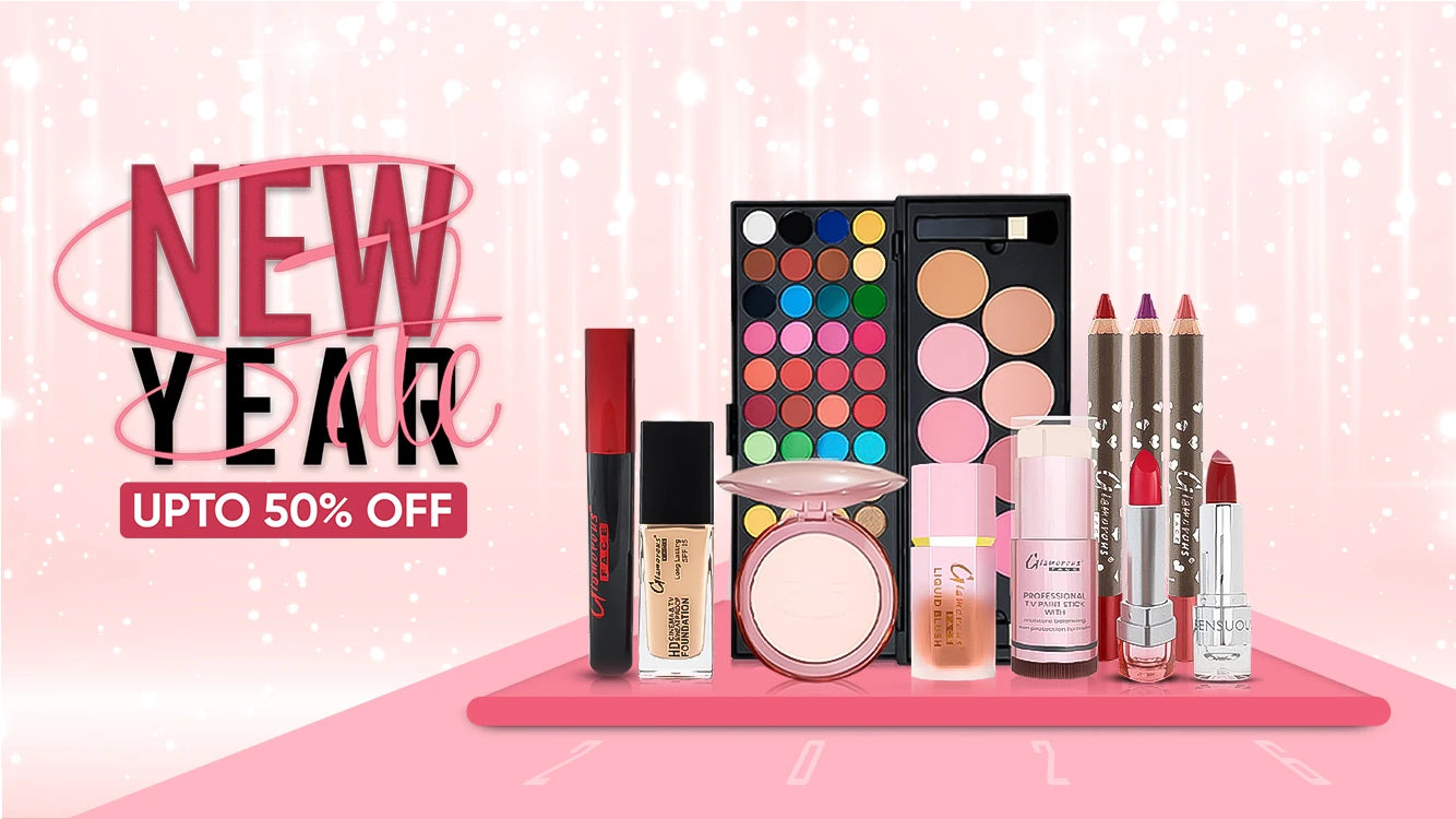 Makeup products on a pink surface with 'New Year' sale text